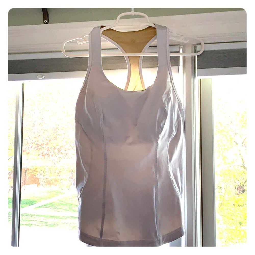 White lululemon workout top.